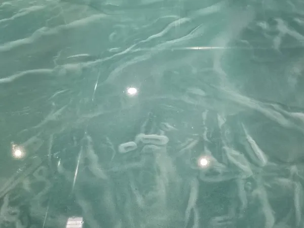 Space with polished metallic epoxy flooring